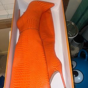 Orange mid boots size 8